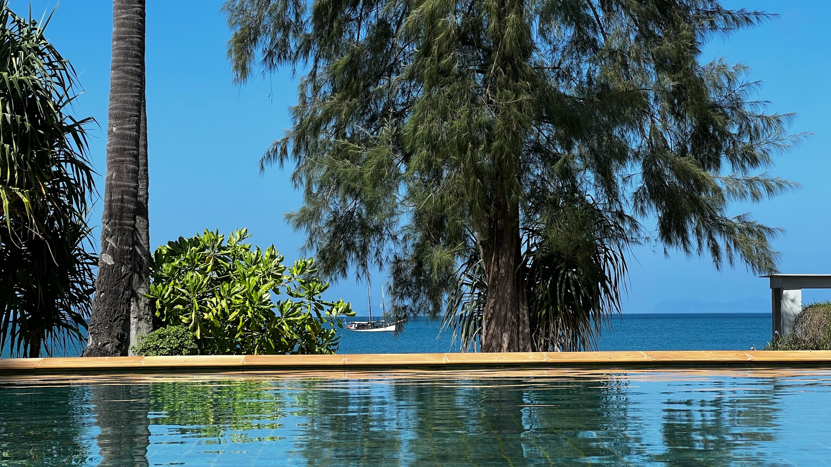 Pool with ocean view and boat